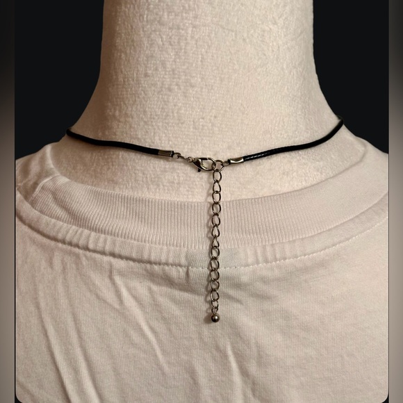 Silver Skull Cross Pendant on a Black Cord Necklace - Picture 3 of 7